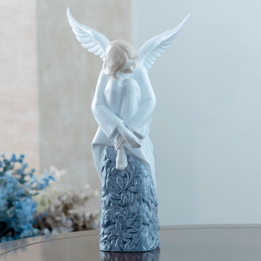 SITTING ANGEL